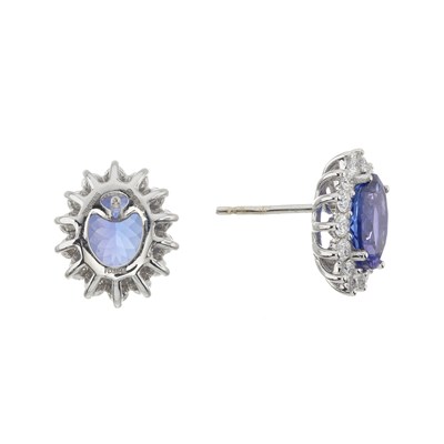Lot 60 - A pair of 18ct gold tanzanite and diamond cluster stud earrings