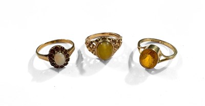 Lot 402 - Three 9ct gold gem-set rings