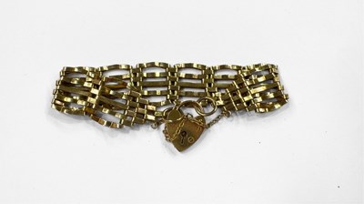 Lot 424 - A 9ct gold gate bracelet, with heart-shape padlock clasp