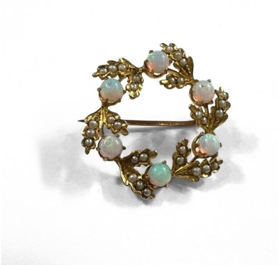 Lot 389 - A 9ct gold opal and seed pearl wreath brooch