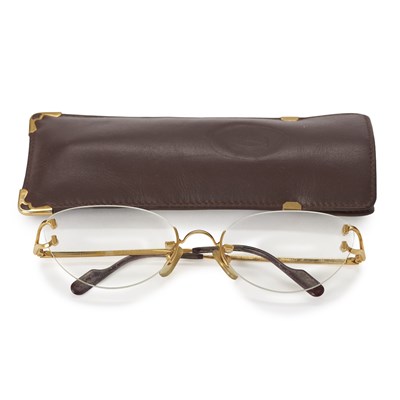 Lot 211 - Cartier, a pair of rimless prescription glasses w/pouch