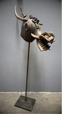 Lot 551A - A Senufo carved wooden helmet mask (Kponyugo),...