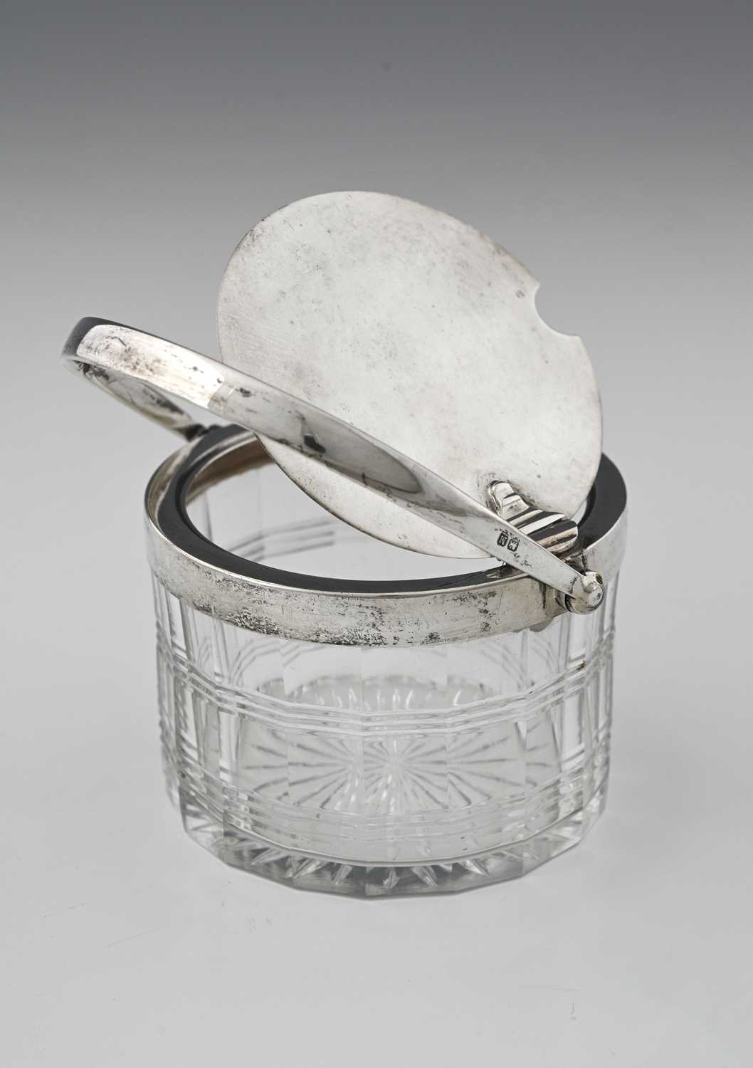 Lot 153 - An Art Deco silver mounted and cut glass...