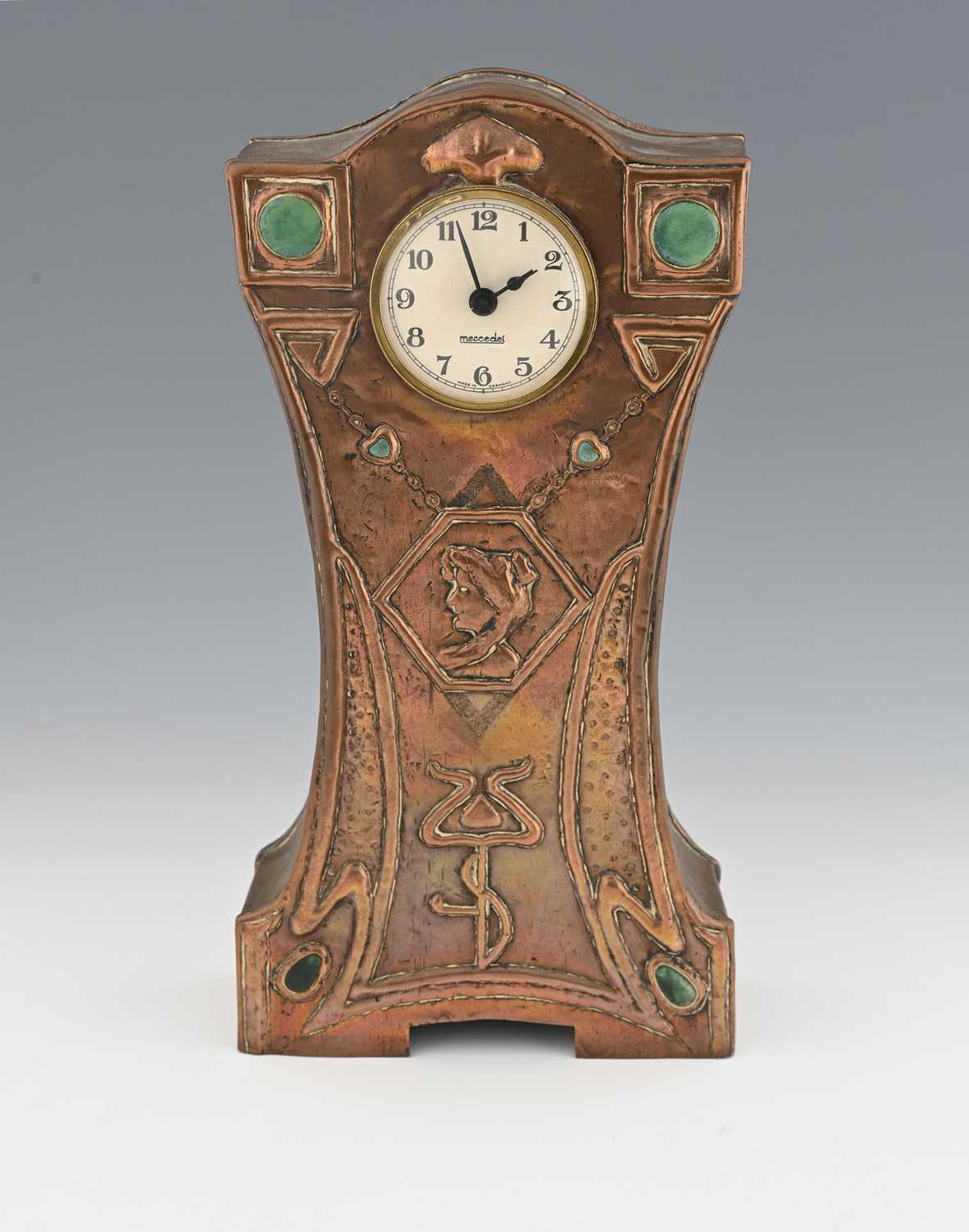 Lot 182 - An Arts and Crafts copper and Ruskin set clock,...