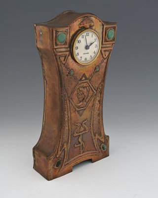 Lot 182 - An Arts and Crafts copper and Ruskin set clock,...