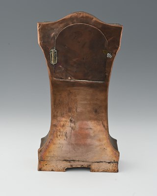 Lot 182 - An Arts and Crafts copper and Ruskin set clock,...