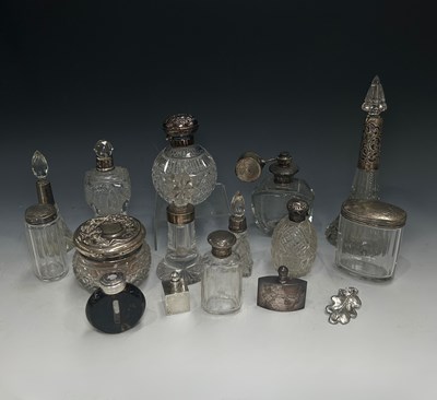 Lot 229 - A collection of silver mounted cut and moulded...