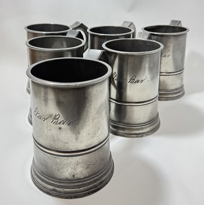 Lot 204 - A set of six pewter quart tankards, inscribed...