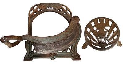 Lot 202 - Mickey Mouse cast iron trivet, 14.5cm diameter,...