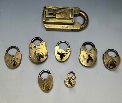 Lot 235 - A collection of 19th century brass padlocks,...