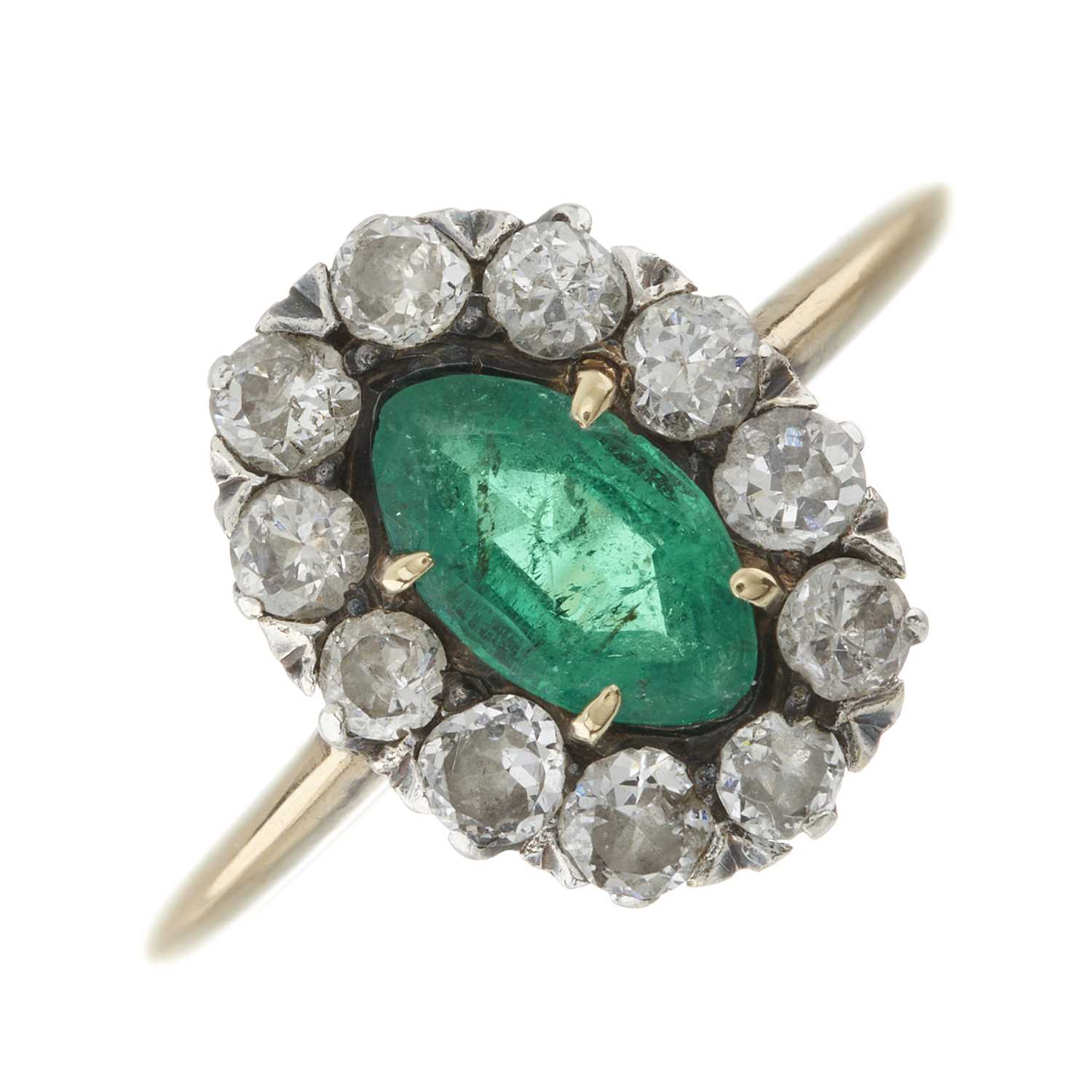 Lot 2 - An early 20th century gold emerald and diamond cluster ring