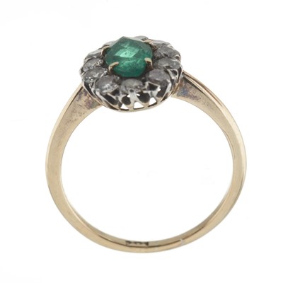 Lot 2 - An early 20th century gold emerald and diamond cluster ring