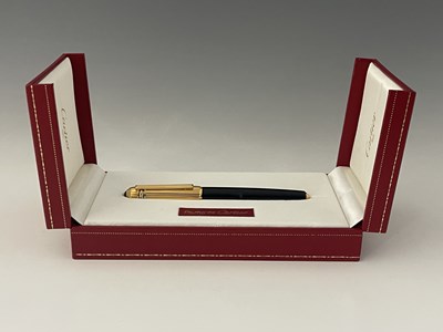 Lot 212 - Cartier, a Pasha de Cartier Trinity fountain pen.