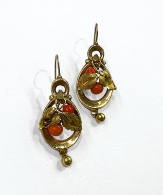 Lot 415 - A pair of early 20th century yellow metal coral foliate drop earrings