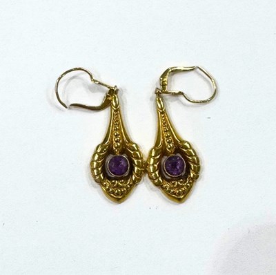Lot 414 - A pair of gold amethyst drop earrings
