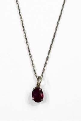 Lot 430 - A ruby single-stone pendant, with chain