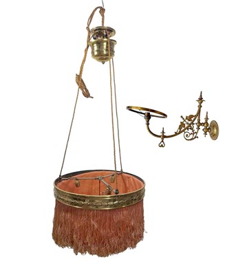 Lot 687 - A late 19th century brass wall sconce, the...