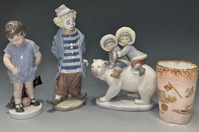 Lot 121 - A Royal Copenhagen model of a boy, modelled...