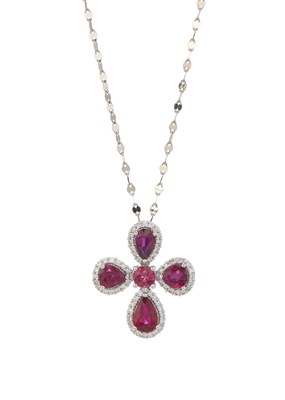 Lot 102 - A platinum ruby and brilliant-cut diamond cluster pendant