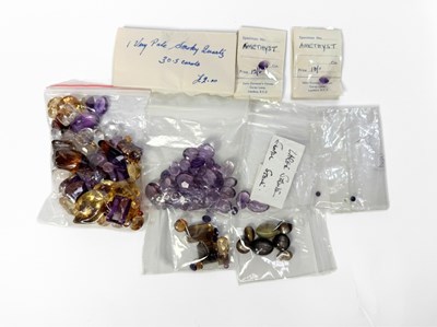 Lot 450 - A selection of mainly loose faceted quartz gemstones