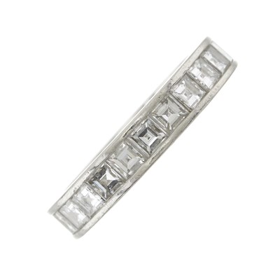 Lot 97 - A mid 20th century platinum diamond full eternity ring