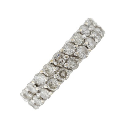Lot 137 - A brilliant-cut diamond two-row full eternity ring
