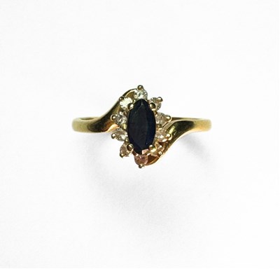 Lot 410 - An 18ct gold sapphire cluster ring