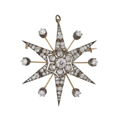 Lot 124 - A late Victorian silver and gold, diamond star pendant brooch