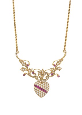 Lot 125 - An Edwardian 15ct gold ruby and split pearl heart locket necklace
