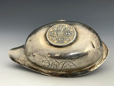 Lot 174 - A George III silver coin set ladle, Josiah...