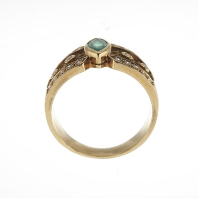 Lot 50 - An 18ct gold emerald and diamond dress ring