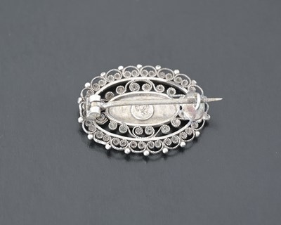 Lot 19 - Marius Hammer, a silver blue enamel brooch