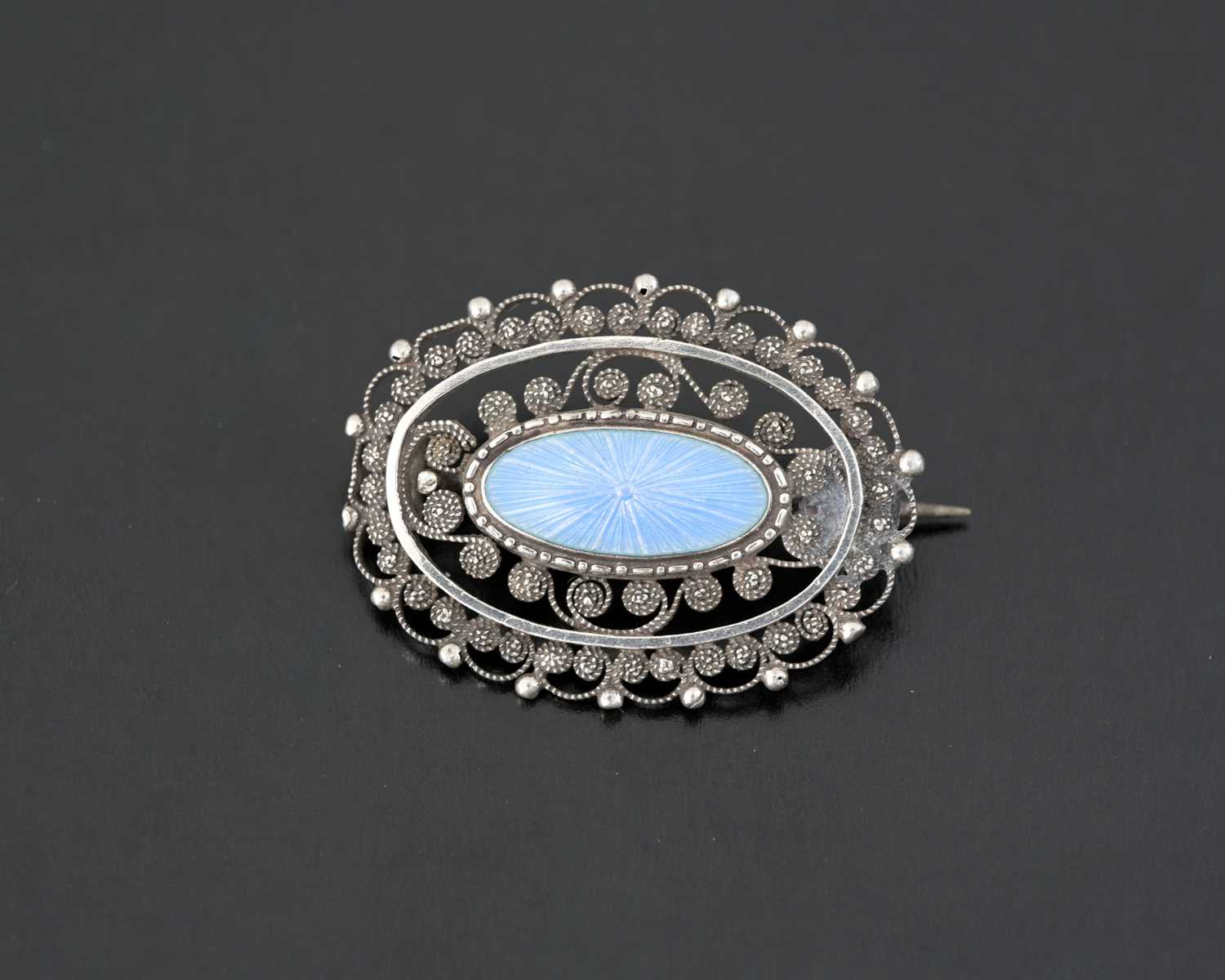 Lot 19 - Marius Hammer, a silver blue enamel brooch