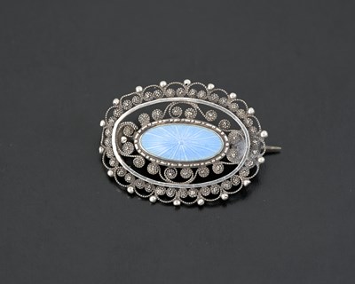 Lot 19 - Marius Hammer, a silver blue enamel brooch