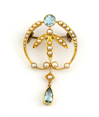 Lot 10 - An Art Nouveau gold aquamarine and split pearl foliate brooch