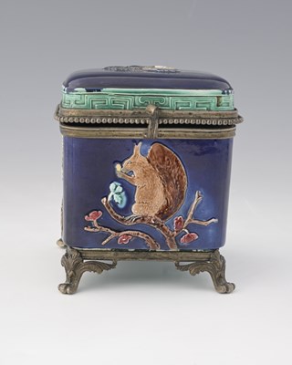Lot 612 - An Aesthetic Movement metal mounted majolica...