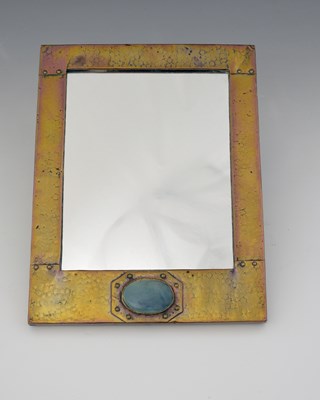 Lot 117 - An Arts and Crafts Ruskin cabochon set copper...