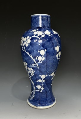 Lot 129 - A Chinese blue and white vase, inverse...