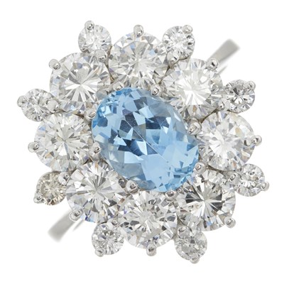 Lot 118 - An 18ct gold aquamarine and diamond cluster ring