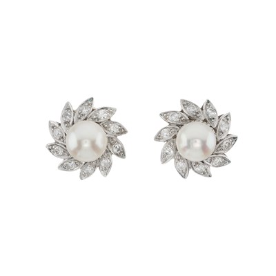 Lot 99 - A pair of cultured pearl and diamond floral clip earrings