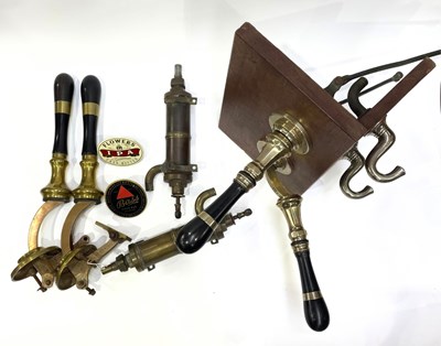 Lot 12 - A pair of J Warne pub beer taps, with brass...
