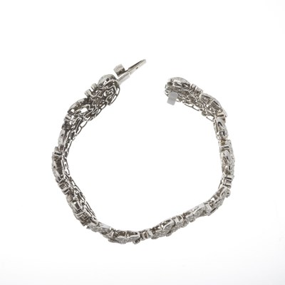 Lot 55 - A diamond foliate line bracelet