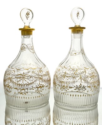 Lot 401 - A pair of gilt glass magnum decanters, circa...