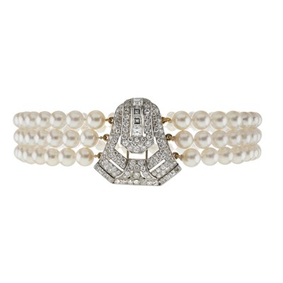 Lot 110 - A mid 20th century pearl necklace, with diamond detachable geometric clasp brooch