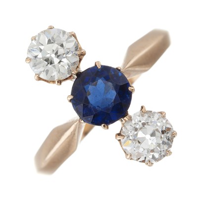 Lot 32 - An early 20th century gold sapphire and diamond three-stone ring