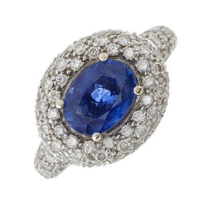 Lot 79 - An 18ct gold sapphire and diamond cluster dress ring