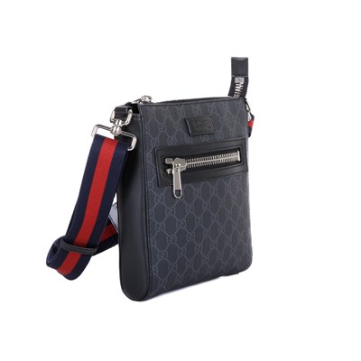 Lot 247 - Gucci, a Supreme messenger bag.