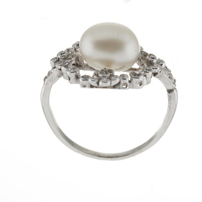Lot 40 - An early 20th century natural pearl and diamond floral dress ring