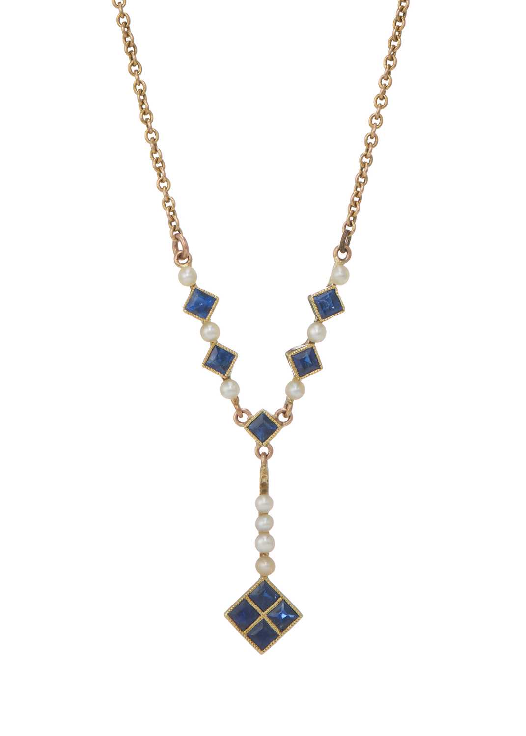 Lot 18 - An Edwardian gold sapphire and pearl drop necklace