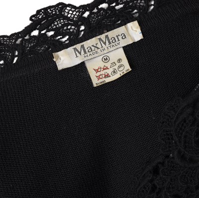 Lot 363 - A designer blouse and jumper.